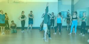 Beginner Handstand tutorial in workshop group setting.