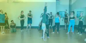 Beginner Handstand tutorial in workshop group setting.
