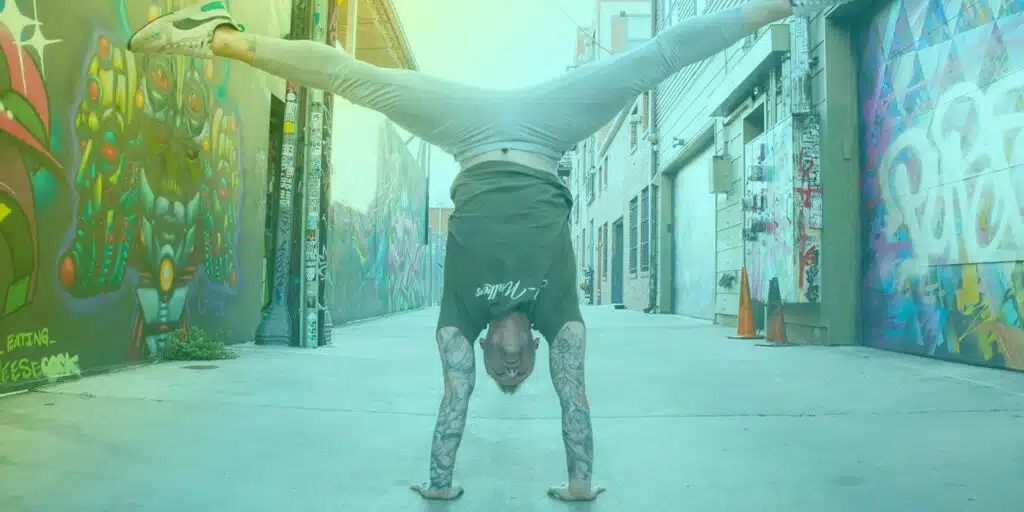 How To Handstand cover photo. Handstand in urban setting.