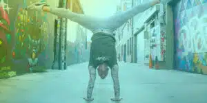 How To Handstand cover photo. Handstand in urban setting.